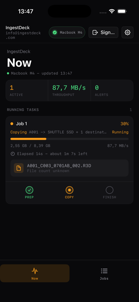 IngestDeck iOS monitor — the selected companion view showing live offload jobs with progress, throughput and ETA.
